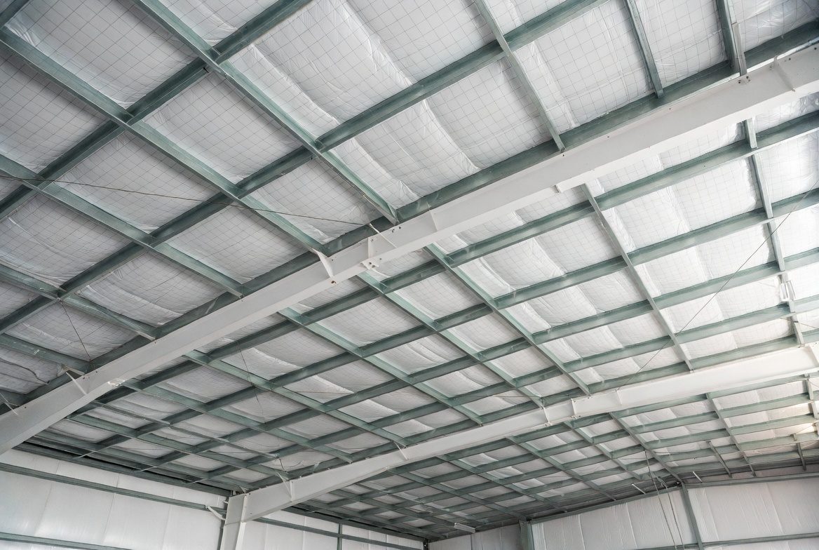 White faced insulation as the finished interior of a metal building
